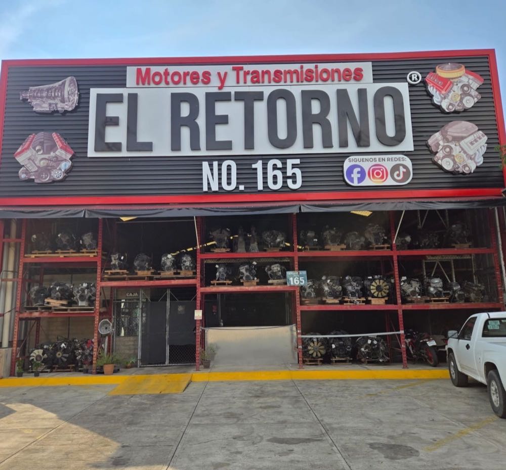 Fachada de Motores y Transmisiones El Retorno, letrero grande con el número 165